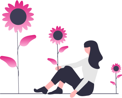 A woman is sitting in a field of sunflowers